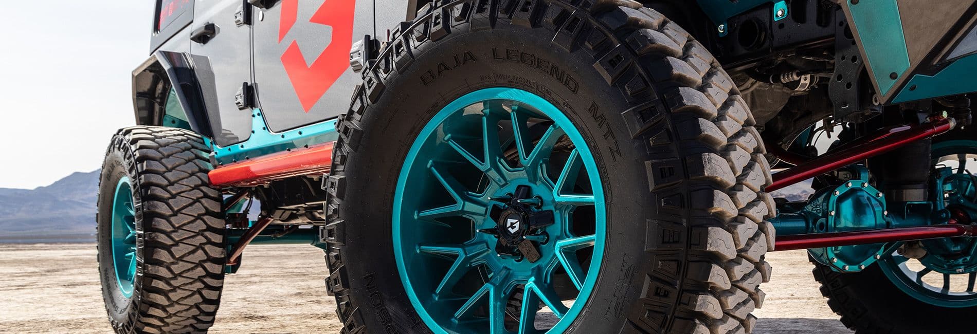 Jeep in turquoise and red