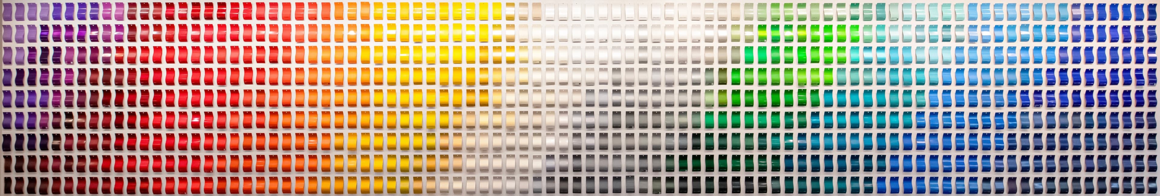 A vibrant collection of powder coating color swatches
